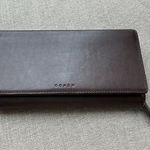 Coach tri-fold leather wallet.